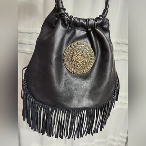Hobo, Black Fringe Leather Bag with Gold Medallion Accent. Quite firm on price!